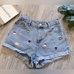 Solar system patch high waisted elastic band cuffed shorts.